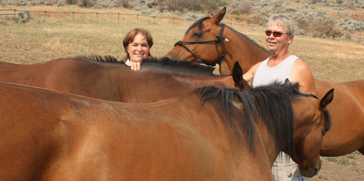 firefolospottedlakeweb Lynn and Alex Sutton were able to move their three horses off their property when the fire threatened to move in their direction. Photo by Paul Everest - Click on picture for larger image