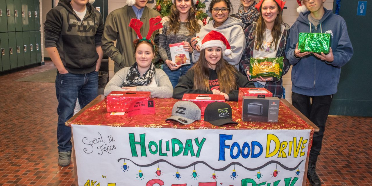 OSS social justice students learn about poverty through local food drive project
