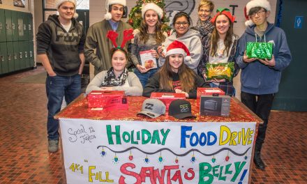 OSS social justice students learn about poverty through local food drive project