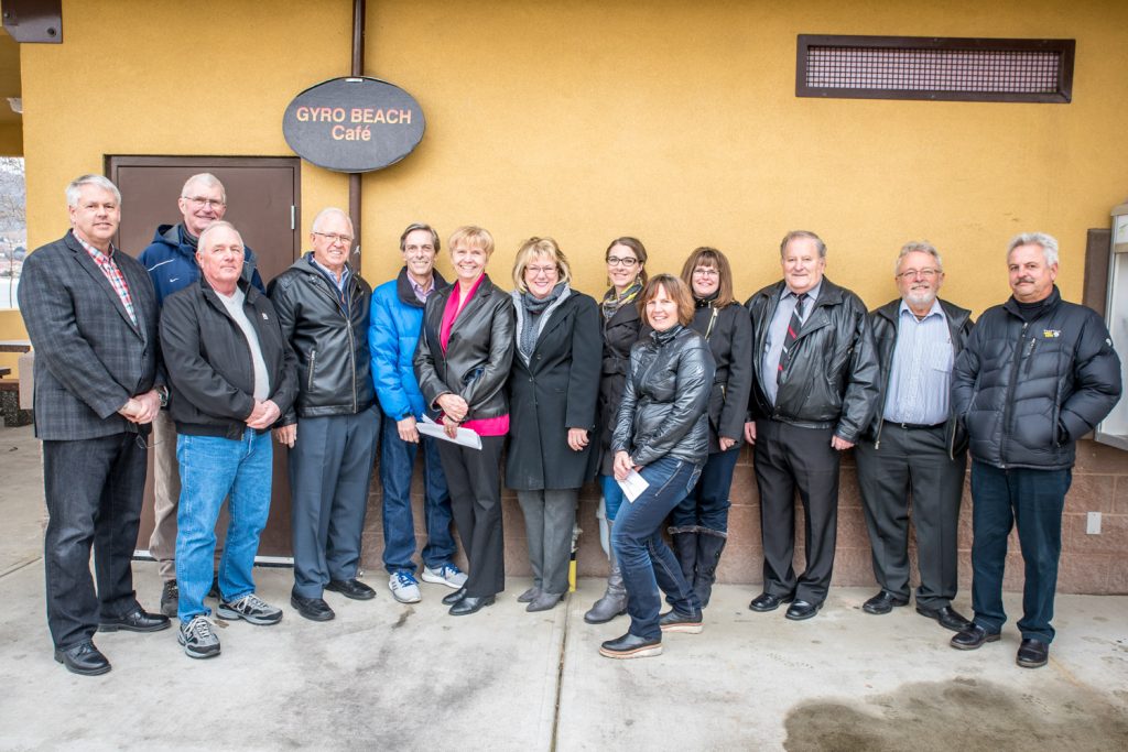 MLA Linda Larson (fifth from left) brought municipal representatives from across Boundary-Similkameen to Gyro Park in Osoyoos for an announcement of $433,000 in funding for community projects. The funding is from the four-year Rural Dividend program which is intended to help rural communities diversify their economies beyond resource dependence. Nonetheless, Larson underlined the importance of natural resources to B.C.’s economy. (Richard McGuire photo)