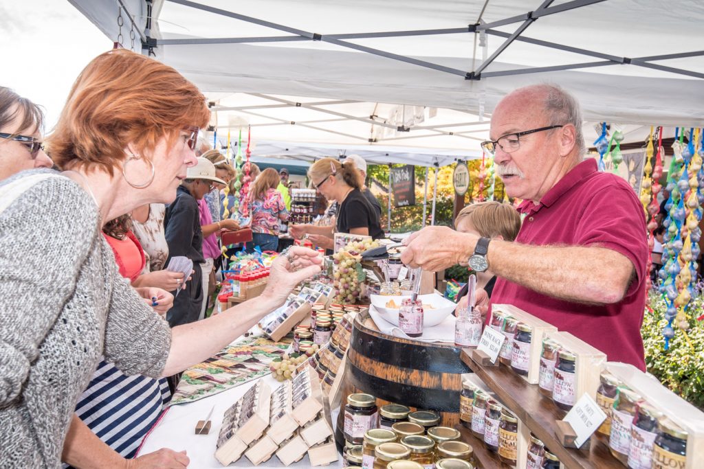 Ric Stacey, of Lone Willow from Ladner, B.C., was offering samples of his wine-based jellies at his booth at Hester Creek's fifth annual Garlic Festival on Saturday. (Richard McGuire photo)