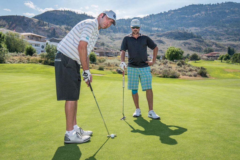 The temperature was close to 40 degrees when we caught up with Drew Bolokoski (left) and Andrew Goncalves, who were golfing around the clock to raise money for ALS on Friday. Bolokoski is the head professional and Goncalves is the assistant professional at the Osoyoos Golf Club. Just before 4 p.m. they had been around the course nine times, starting at 5:15 a.m. They were drinking lots of water. (Richard McGuire photo)