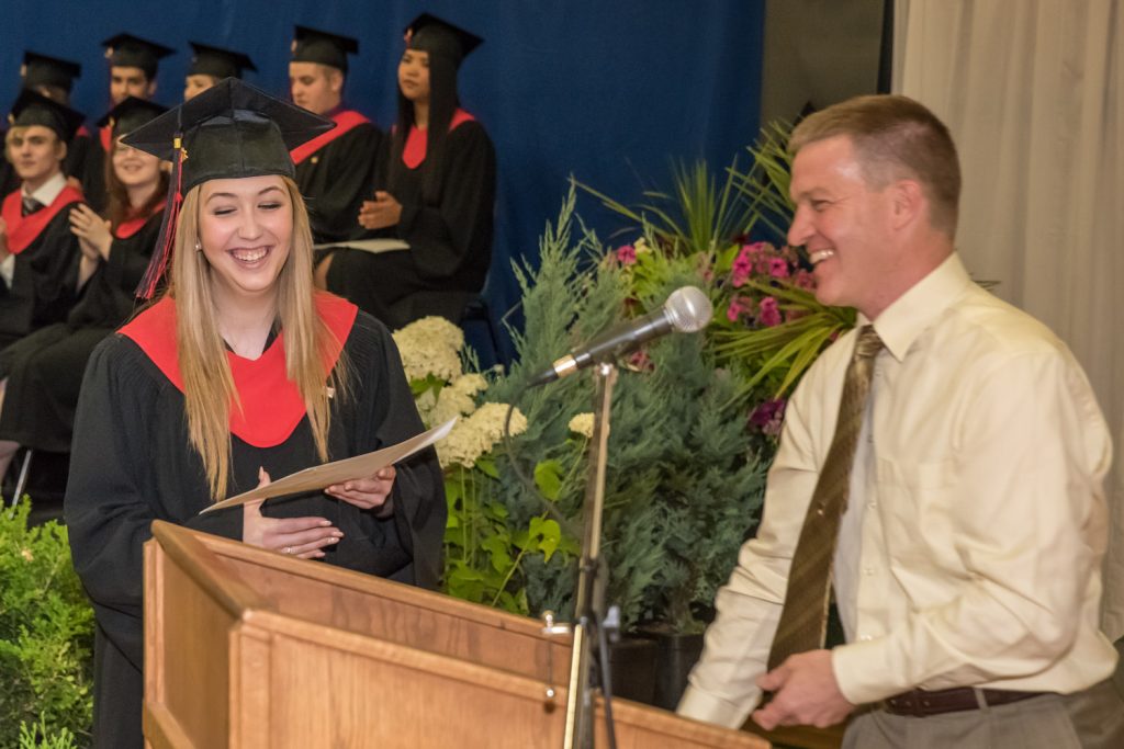 Teacher Peter Gajda presents the South Okanagan Similkameen Teachers' Union award to Cailyn Mocci. (Richard McGuire photo)