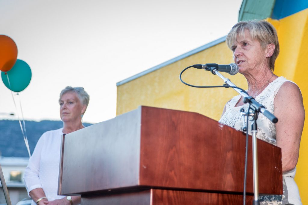 MLA Linda Larson (right) brings greetings at an event celebrating the renovations to Gyro Park while Mayor Sue McKortoff awaits her turn to speak. The renovations were largely funded by the Resort Municipality Initiative, a provincial program to assist resoirt municipalities including Osoyoos. (Richard McGuire photo)