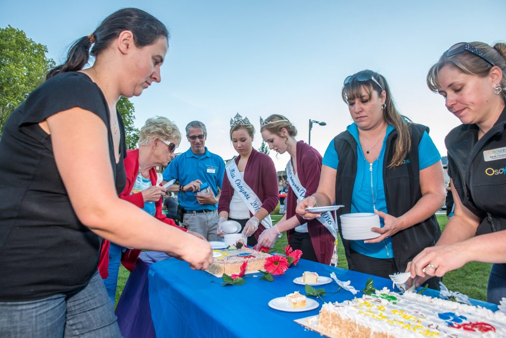 Councillor Mike Campol, Miss Osoyoos Emmaleigh Diwell, Princess Laura Devries and town employees Tamara Morgan and Sarah Dynneson were busy serving cake to people who attended the celebration for the Gyro Park improvements. (Richard McGuire photo)