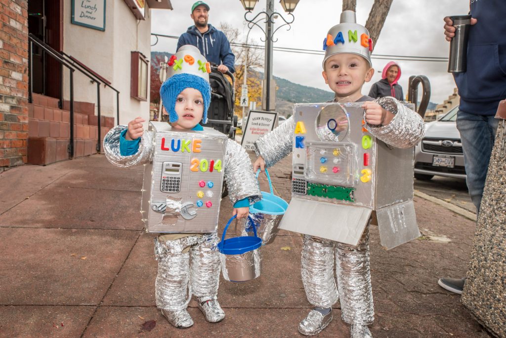Luke, almost 2, and Jake, 3, Schmidt went out as robots during Trick or Treat Main Street Monday afternoon. (Richard McGuire photo)