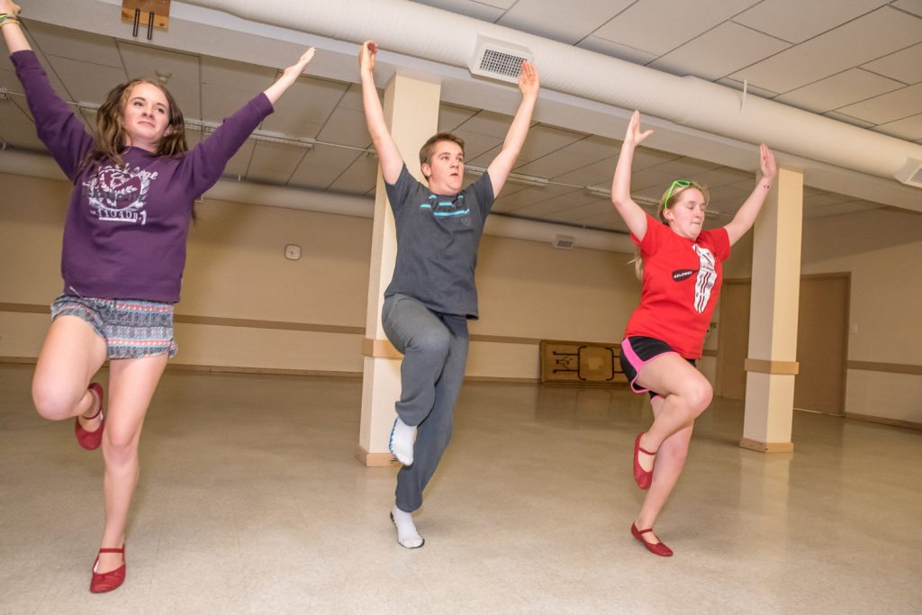 The Aspell siblings (from left) Taryn, Scott and Teagen were busy rehearsing Monday evening for their Ukrainian dance performance at Harvesting Diversity. Training and choreographing them is Grant Storzuk, a chamber of commerce board member and physiotherapist who is also a world-class Ukrainian dancer. (Richard McGuire photo)