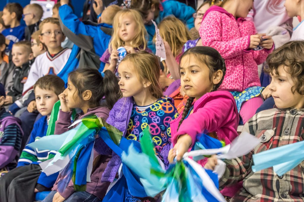 Kindergarten children made streamers to cheer on the teams when Osoyoos Elementary School’s Hockey Academy finished the season with their Charity Classic match last Wednesday at the Sun Bowl Arena. (Richard McGuire photo)