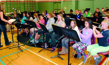 Schell helps talented school musicians in Oliver – prepares for Crooner show