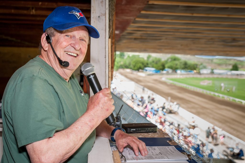 Tom Shields called the races from a booth above the seating area. Shields, who has been mayor of Osoyoos, has a long background with horse racing and called the races in the earlier days of Desert Park. (Richard McGuire photo)