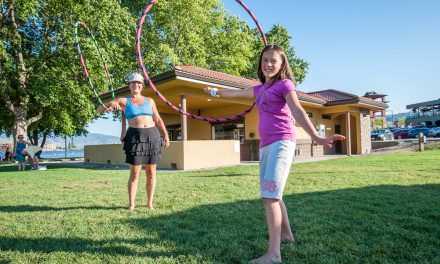 Fitness teacher promotes health benefits of hula hoops