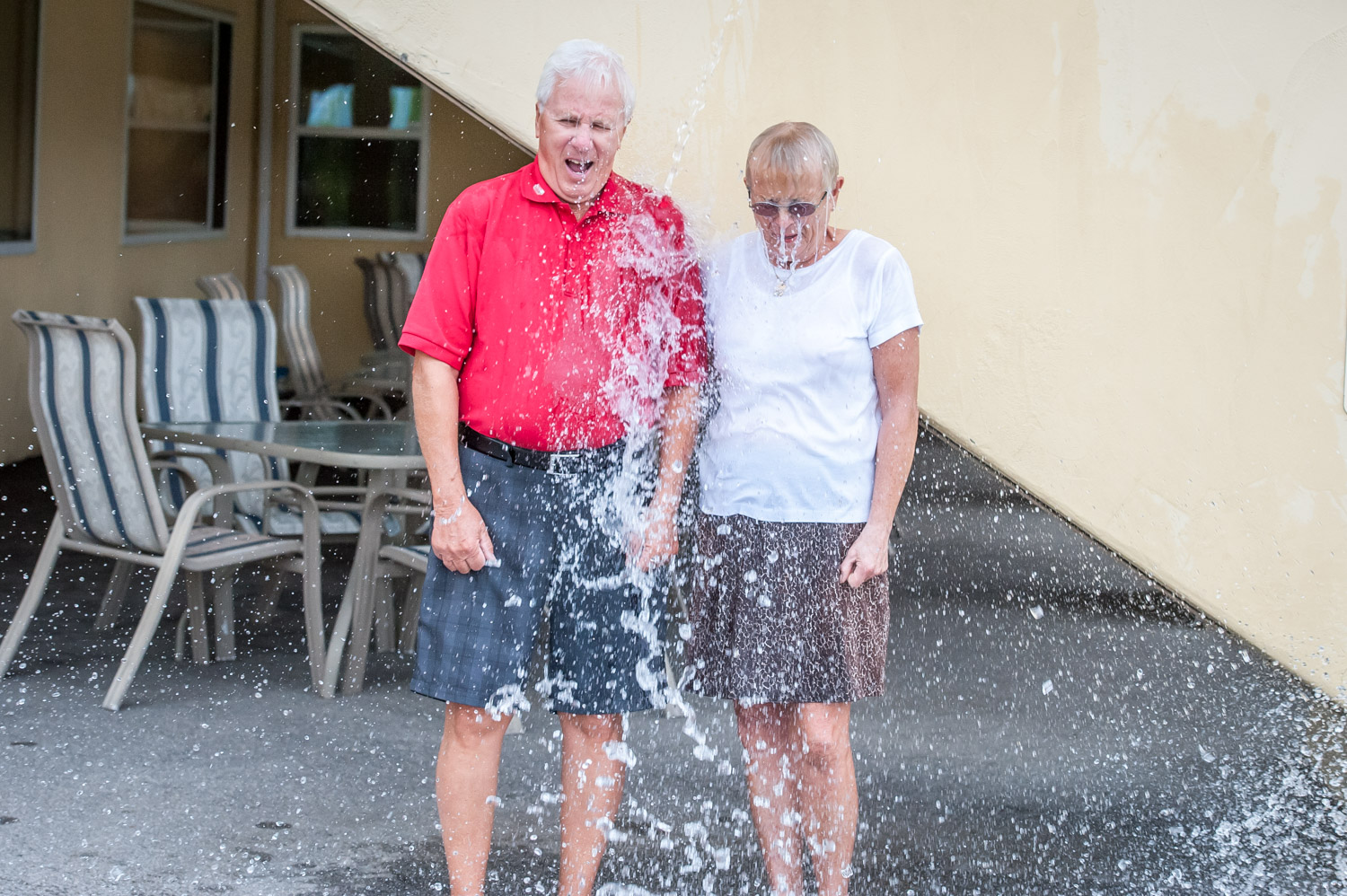 After enduring the ALS Ice Bucket Challenge once with staff from the Osoyoos Golf Club pro shop, Arnie and Anne Polischuk did it again on their own. They lost their son Blair to the dreaded disease two years ago. The challenge has raised nearly $100 million for ALS research. (Richard McGuire photo)