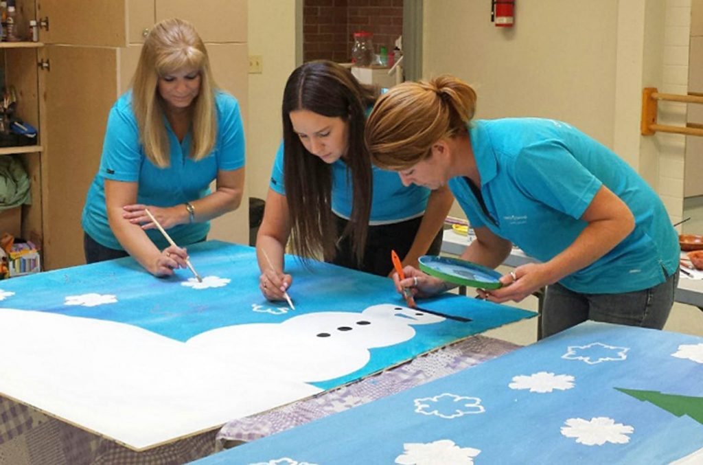 Volunteers from Interior Savings in Okanagan Falls got a little artsy by helping parks and recreation with their murals project last year during Day of Difference. Interior Savings employees also helped the Rotary Club of Osoyoos to do a road clean-up and in Oliver they did some painting and clean-up for the Boys and Girls Club. (Contributed photo)