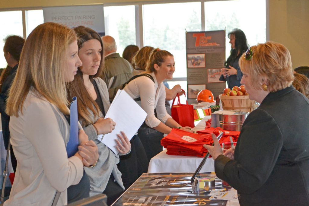 Companies like Watermark Beach Resort, FortisBC, the RCMP, Greyback Construction and the Department of Fisheries and Oceans all came hoping to snag some summer employees as more than 200 job seekers descended on Spirit Ridge resort last Thursday for the second of Open Door Group’s annual spring job fairs, where major employers from all corners of the job market waited eagerly to snap up any potential hires. (Trevor Nichols photo)