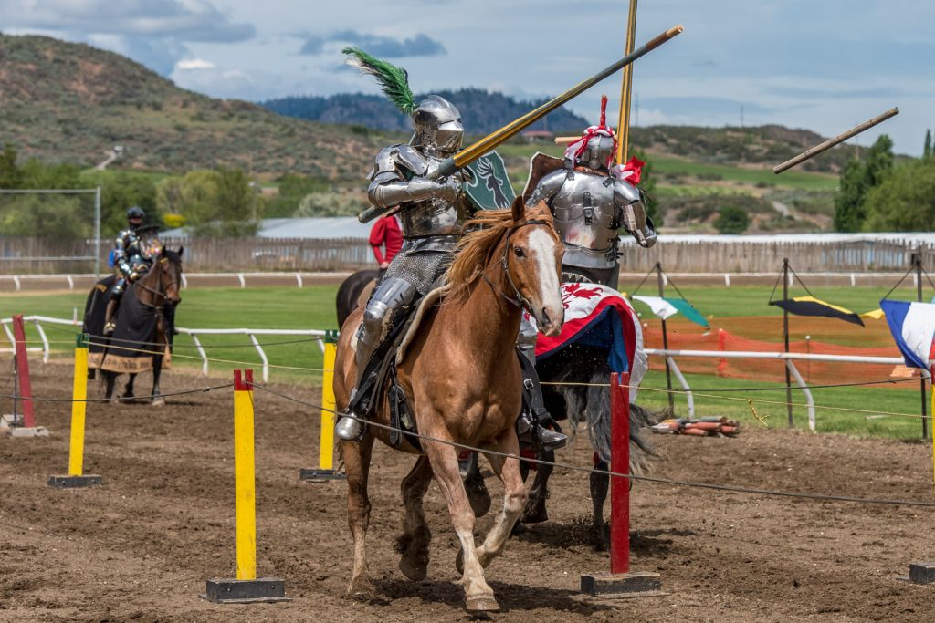A pine wood lance shatters as Ripper Moore (left) meets Stephane Tremblay in a joust on Saturday. (Richard McGuire photo)