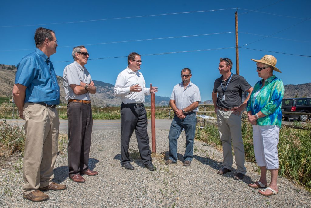 Okanagan-Coquihalla MP Dan Albas (centre) speaks at last Thursday’s announcement of federal funding to connect a portion of the KVR Trail at Road 22 to the existing trail at Road 21. From left are: Terry Schafer, RDOS Area C Director; Bill Newell, RDOS CAO; Albas; Mark Pendergraft, RDOS Chair and Area A Director; Mark Woods, RDOS manager of community services; and Sue McKortoff, mayor of Osoyoos. The trail project must be completed in time for Canada’s sesquicentennial in 2017. Eventually other gaps will be closed in the trail that follows the old bed of the former Kettle Valley Railway. (Richard McGuire photo)