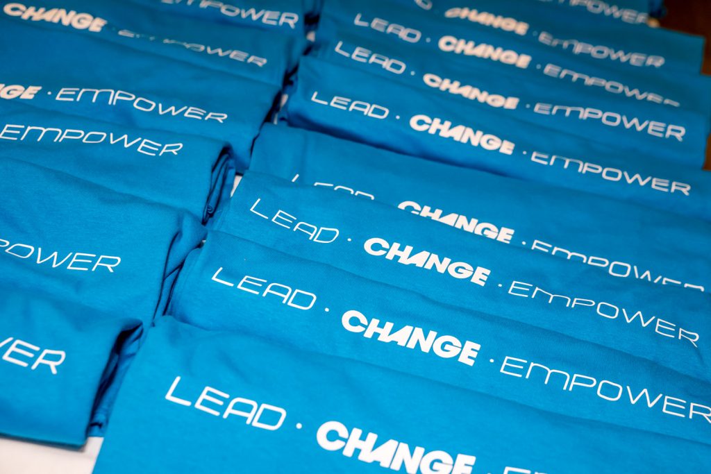 T-shirts spread a leadership message of Lead, Change, Empower. (Richard McGuire photo)