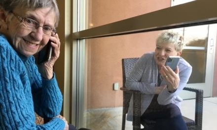 Care workers keeping isolated seniors connected
