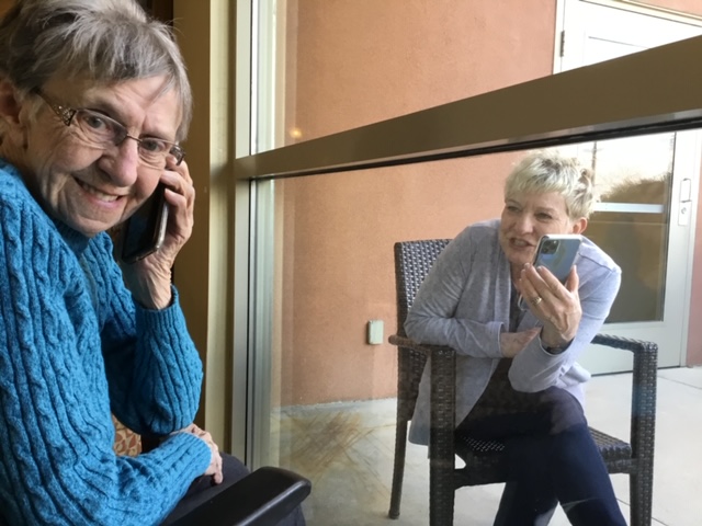 Care workers keeping isolated seniors connected