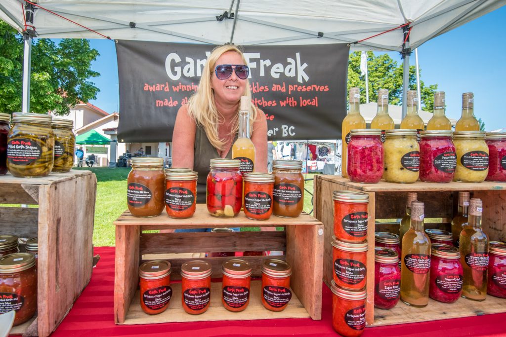 Market on Main opened for the season on Saturday. While it's too early from fresh fruit and vegetables, there were vendors selling crafts, preserves and other items. Pictured here Renee Paquin of Garlic Freak in Oliver was selling sauerkraut, pickles and hot sauces. (Richard McGuire photo)