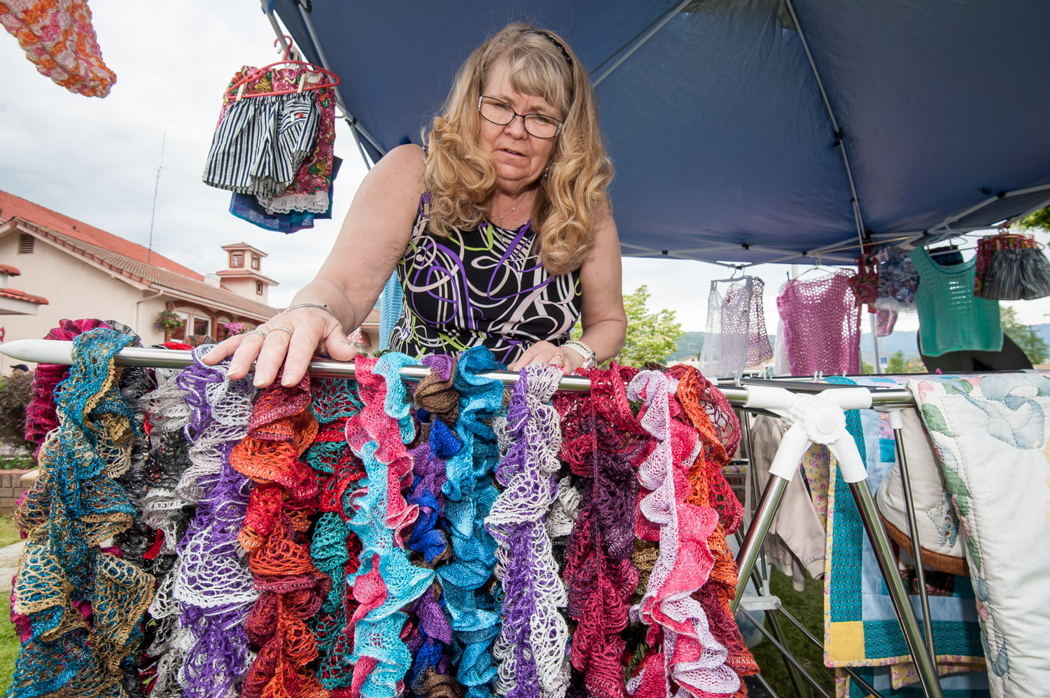 Jan Kennay, of Osoyoos, was selling colourful crocheting in her booth at Market on Main, which opened Saturday. (Richard McGuire photo)