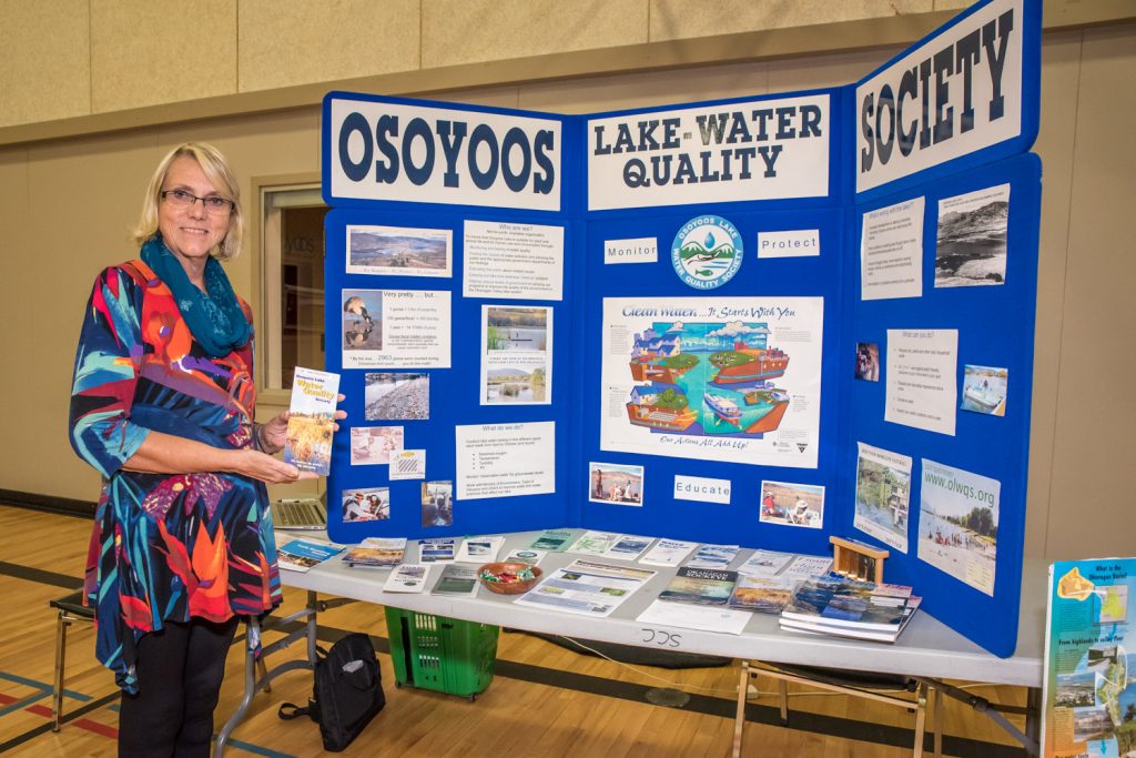 Birgit Arnstein, president of the Osoyoos Lake Water Quality Society, had a booth for her group at the Mass Registration night last Wednesday at the Sonora Community Centre. The Mass Registration night gave local clubs and organizations a chance to sign up new members and do some public outreach. (Richard McGuire photo)