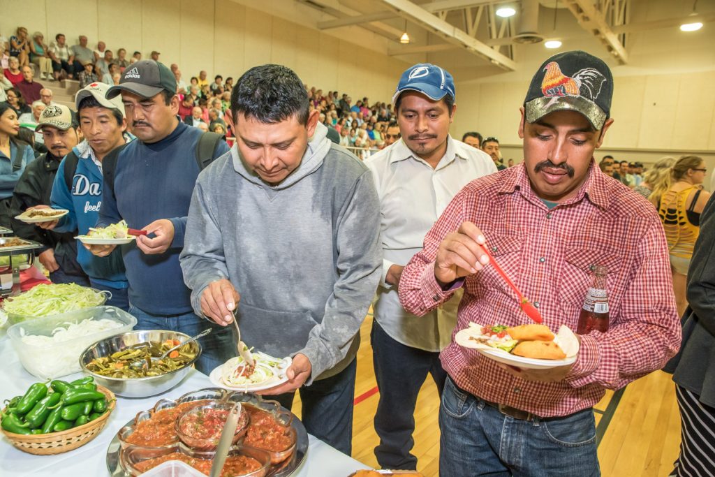 Mexican workers and local residents lined up for traditional tacos. (Richard McGuire photo)