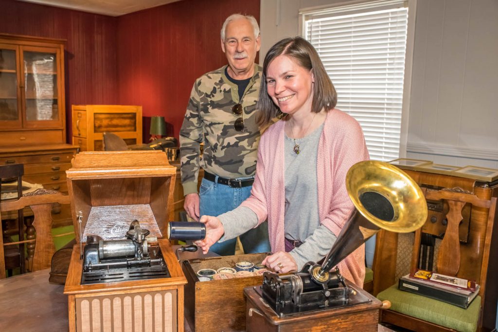 Kara Burton, executive director of Osoyoos Museum, shows two old phonographs that were restored by Allan Gaudreault and are now in the museum's collection. (Richard McGuire photo)