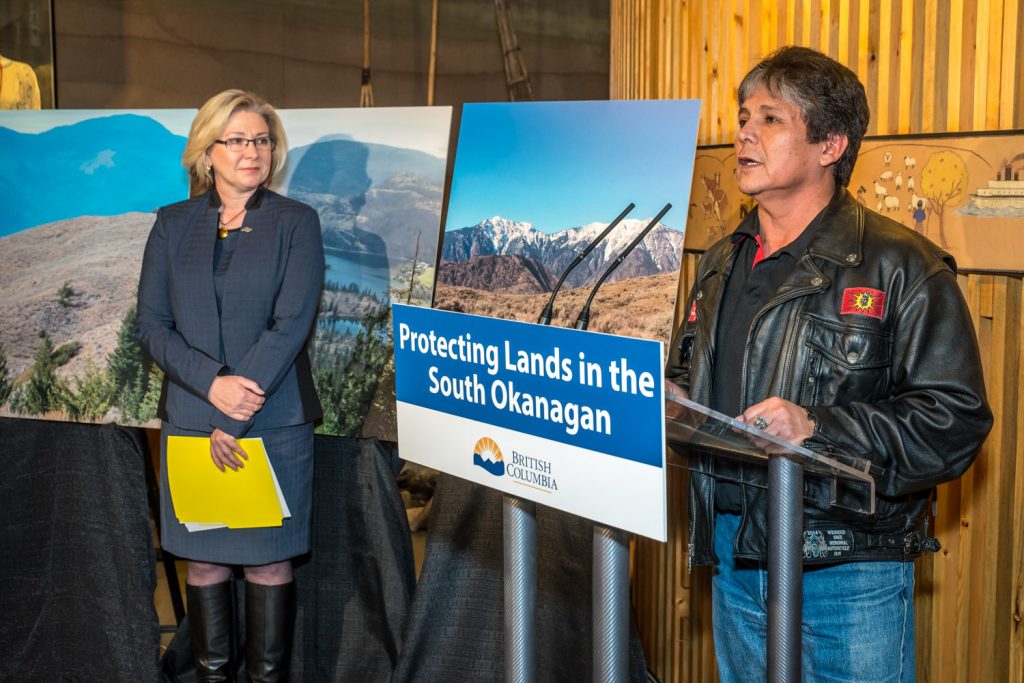 Chief Clarence Louie of the Osoyoos Indian Band spoke on behalf of the three area bands to welcome the resumption of talks aimed at protecting the lands of the South Okanagan. He said there are still many unanswered questions and protecting aboriginal title rights, hunting and fishing are major concerns. (Richard McGuire photo)