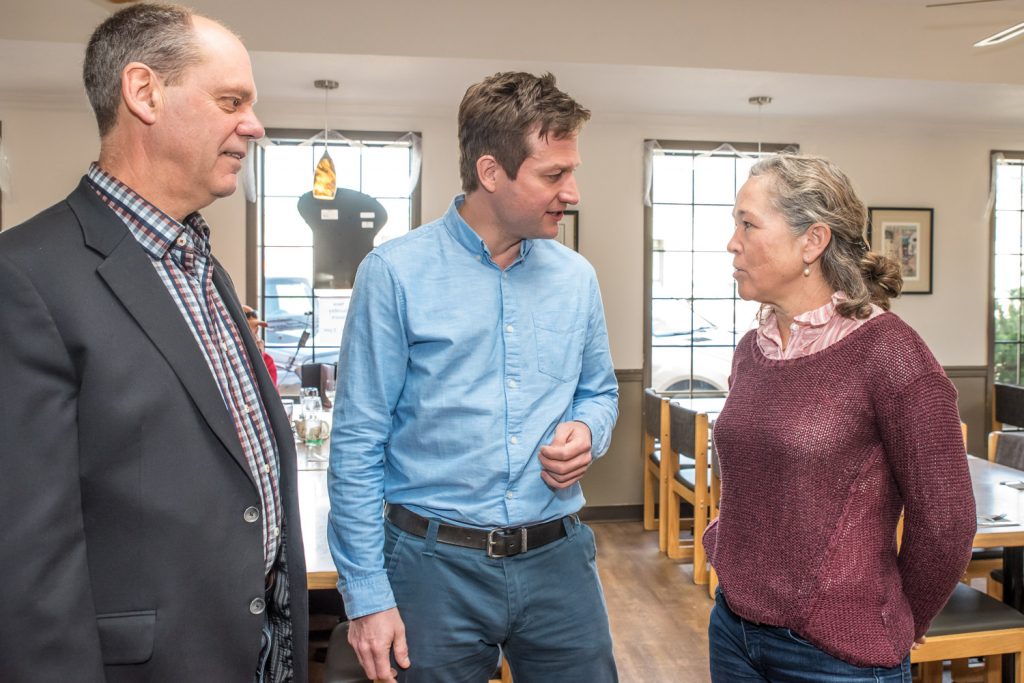 Allan Patton (left) chats with NDP Education Critic Rob Fleming and Grand Forks Councillor Colleen Ross at Troy's Grill in Osoyoos recently. Patton is considering seeking the NDP provincial nomination to run against MLA Linda Larson. (Richard McGuire photo)