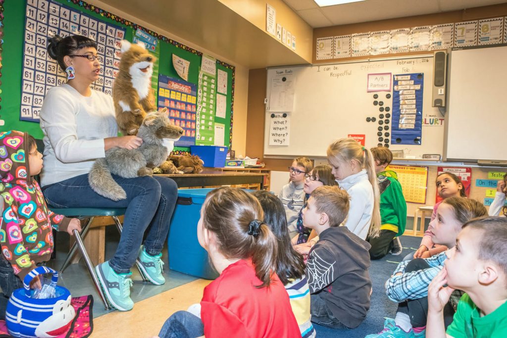 Tiana Lewis used puppets to teach children about animals that are important in the culture of Okanagan people. This was one of the sessions at Osoyoos Elementary School's Okanagan Day last Friday. (Richard McGuire photo)