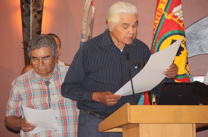 onaunityweb Richard Armstrong (left) and Joey Pierre, both from the Penticton Indian Band, read a Declaration of Unity signed by the Okanagan Nation Alliance and the Colville Confederated Tribes in Osoyoos on July 15. Armstrong read the document in the traditional Okanagan language and Pierre read it in English. Photo by Paul Everest - Click on picture for larger image