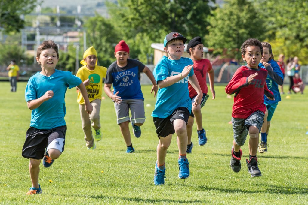 Callum Wallner, Alan Singer and Malcolm Cuthbert move into the lead in the 80-metre dash at Osoyoos Elementary School's track and field day. (Richard McGuire photo)