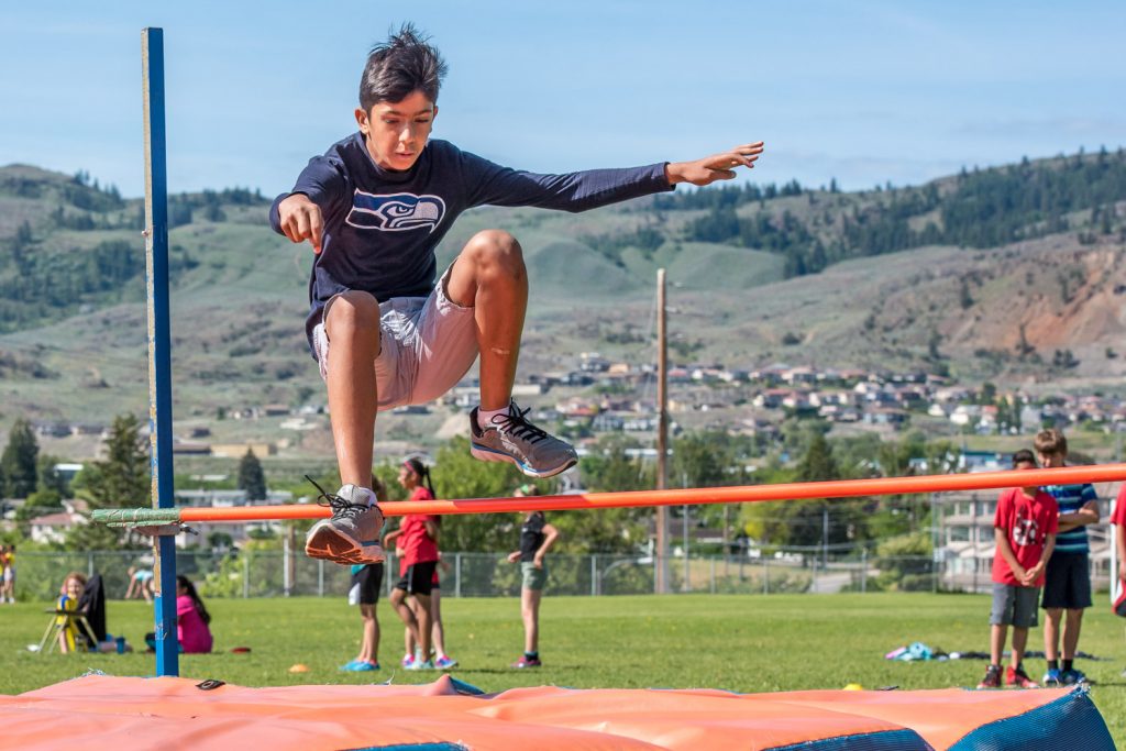 Jaspartap Takher high jumps over the pole at Osoyoos Elementary School's track and field day. (Richard McGuire photo)