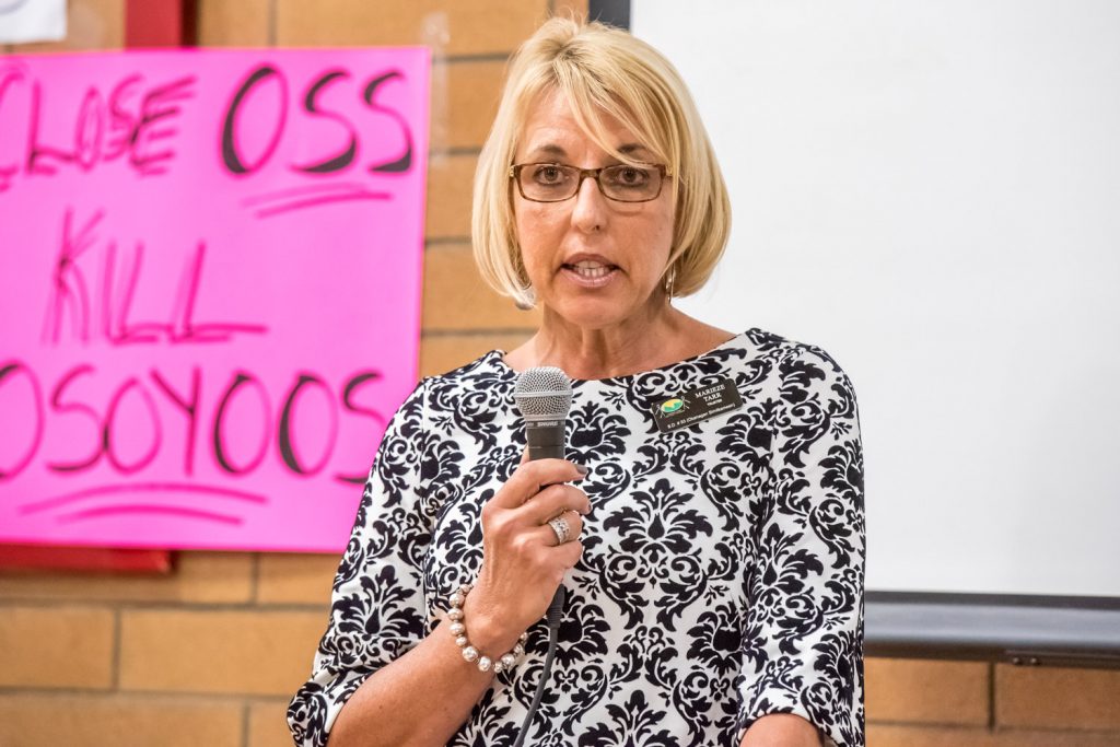 School board chair and Osoyoos Trustee Marieze Tarr opened the meeting. She told the audience she didn't vote on Jan. 13 motions to start the process to close Osoyoos schools, because she was chairing the meeting and the chair doesn't vote except to break a tie. She said if she had voted, she would have opposed the motions. (Richard McGuire photo)