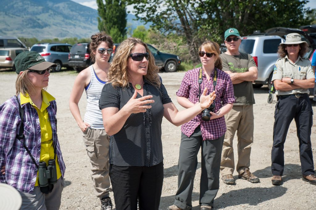 Bryn White, third from left, speaks other nature lovers at the official opening Friday of new information panels in the kiosk at the Osoyoos Oxbows. White is program manager at the South Okanagan Similkameen Conservation Program (SOSCP), an umbrella group of conservation organizations. The project was a joint effort of a number of organizations, with government assistance and local donations. (Richard McGuire photo)