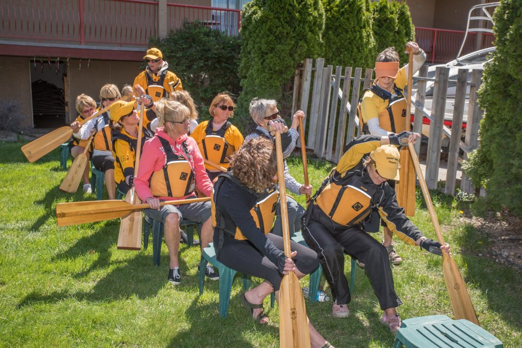 Using chairs to simulate a dragonboat, potential new members of the Osoyoos Lake Paddling Club were give a lesson on technique at an event in Osoyoos on Saturday. (Richard McGuire photo)