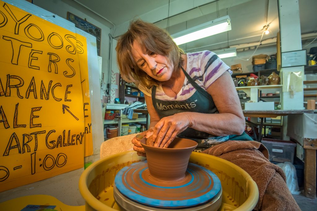 Potter Lucy Stoppler "throws" a bowl for the Empty Bowls Fundraiser for Desert Sun Counselling and Resource Centre. (Richard McGuire photo)