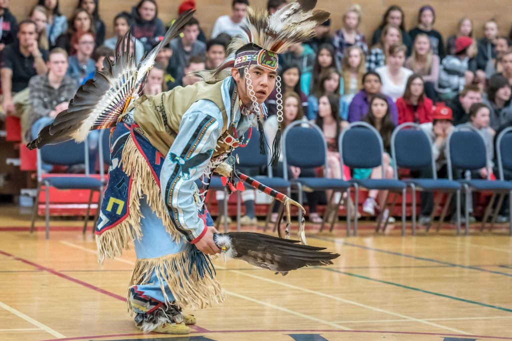 Emery Robins Jr. performs a solo dance during the "Celebration of Traditions" traditional pow wow held at Osoyoos Secondary School on Friday and Saturday. The pow wow, hosted by School District 53's Aboriginal Education Council, rotates each year between the high schools in the district. Robins is from Vernon. (Richard McGuire photo)