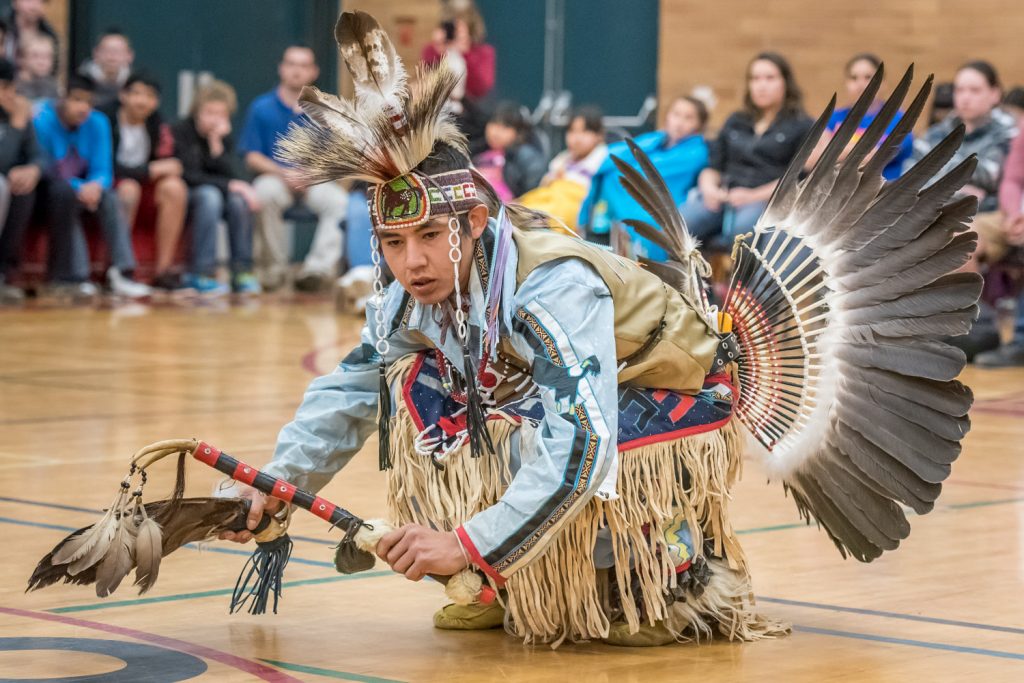 Emery Robins Jr. performs a solo dance during the "Celebration of Traditions" traditional pow wow held at Osoyoos Secondary School on Friday and Saturday. The pow wow, hosted by School District 53's Aboriginal Education Council, rotates each year between the high schools in the district. Robins is from Vernon. (Richard McGuire photo)
