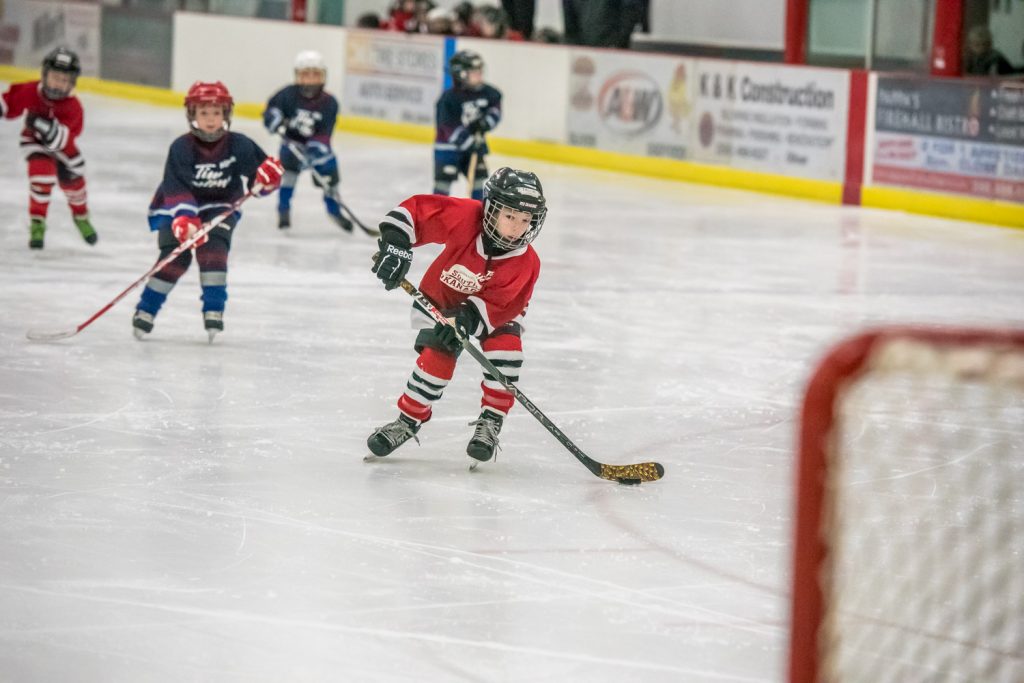 Talon Lowton of the South Okanagan Red Dragons skates in on a breakaway in the Hockey Wars Pre-Novice Tournament at the Oliver Arena on Saturday. In this game the local team faced the West Kelowna Sharks. Six teams participated in the tournament that included children as young as four. Players on the Red Dragons come from Osoyoos, Oliver, Keremeos and the surrounding area. (Richard McGuire photo)