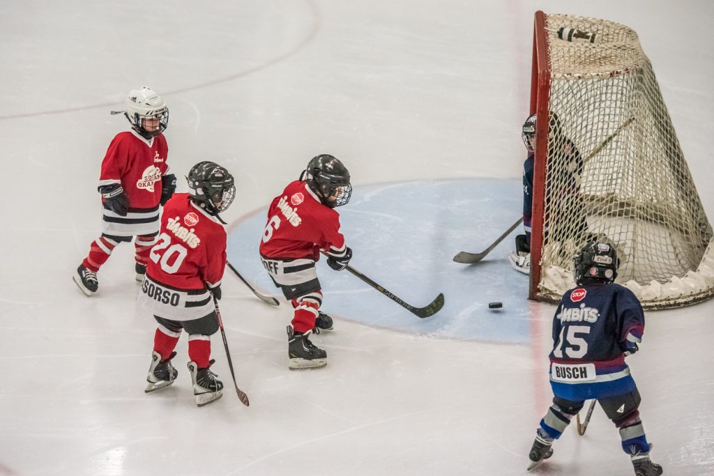 The action is exciting around the West Kelowna Sharks’ net as the South Okanagan Red Dragons turn up the pressure. Grayden Lebedoff (No. 6) goes for the puck while Nolan Casorso and an unidentified teammate wait for a rebound. (Richard McGuire photo)