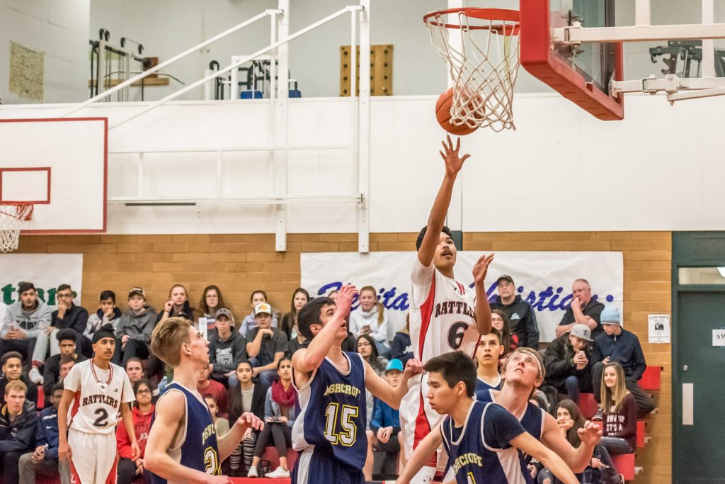 Phil Cabanada of the Osoyoos Rattlers leaps to score two points against Ashcroft in the opening game of the Valleys Tourament on Thursday. (Richard McGuire photo)