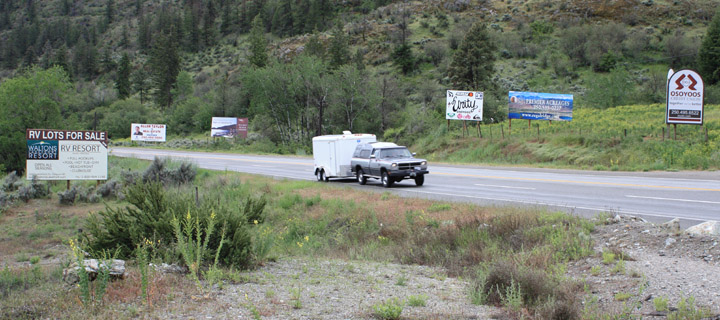 rdossignsweb Kilpoola resident Sherry Linn said the installation of a number of signs like these along Hwy. 3 west of Osoyoos are not in compliance with an RDOS zoning bylaw and she is questioning why the RDOS won’t do something about them. Photo by Paul Everest - Click on picture for larger image