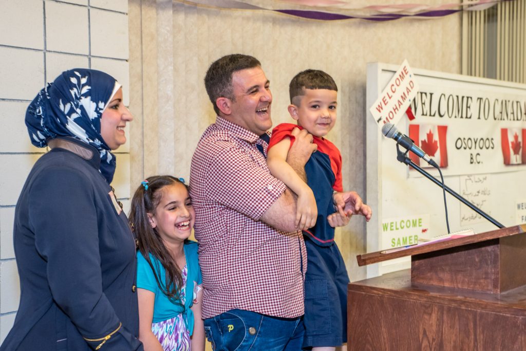 Son Samer's enthusiastic "Thank you" into the microphone caused many people to laugh, including mother Aya, father Mohamad and sister Fatima. (Richard McGuire photo)