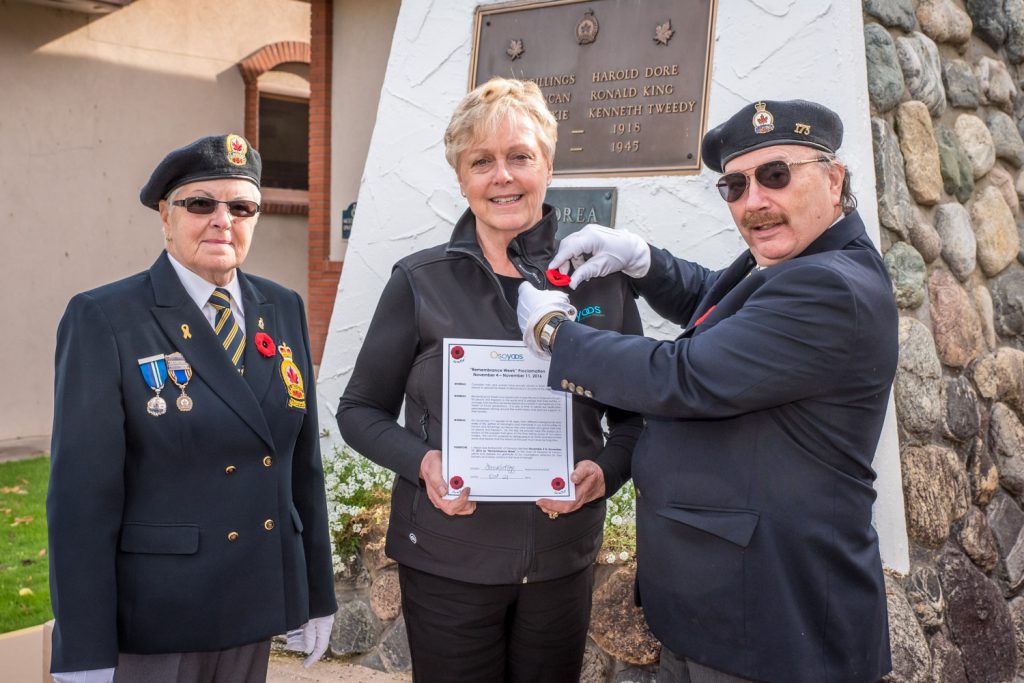 Mayor Sue McKortoff last Friday proclaimed the week of Nov. 4 to 11 as Remembrance Week. Representing the Royal Canadian Legion were Carol Cawdell (left), recording secretary, and Bruce Davies, president. Tagging starts on Oct. 28 and runs both weekends prior to Remembrance Day. There are also boxes in stores where people can pick up their poppies. (Richard McGuire photo)