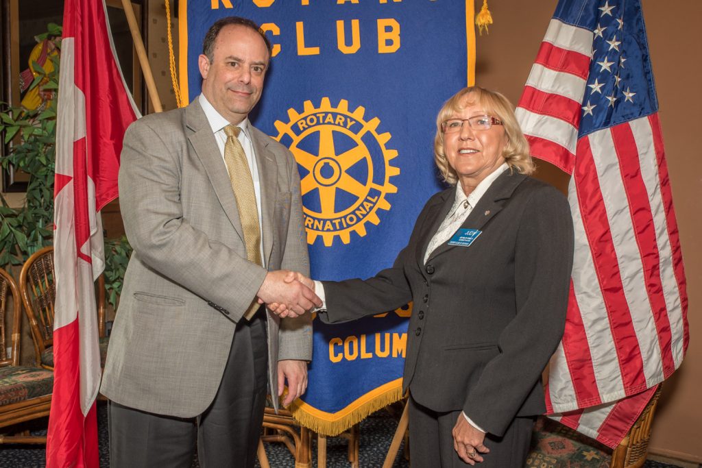 Richard Rosenthal, chief civilian director of the Independent Investigations Office (IIO), spoke to Osoyoos Rotarians last week about the role of his office. Thanking him is Judy Miller-Bennett, president of the Rotary Club of Osoyoos. The IIO investigates cases where a police officer, whether on or off duty, kills or seriously injures someone. When he is not able to exonerate the officer, he refers cases to the Crown for possible charges. (Richard McGuire photo)