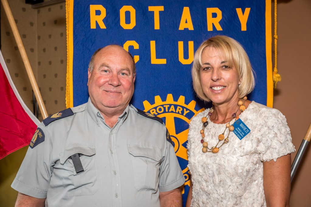 Sgt. Randy Bosch, who assumed command of the Osoyoos RCMP Detachment in June, was guest speaker at the Rotary Club of Osoyoos last Thursday. He was welcomed by club President Marieze Tarr. (Richard McGuire photo)