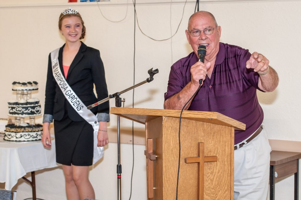 Ali Hutter is crowned as a new princess by outgoing Osoyoos Royalty, Gina Pereira (left) and Viveka Jensen (standing). (Richard McGuire photo)