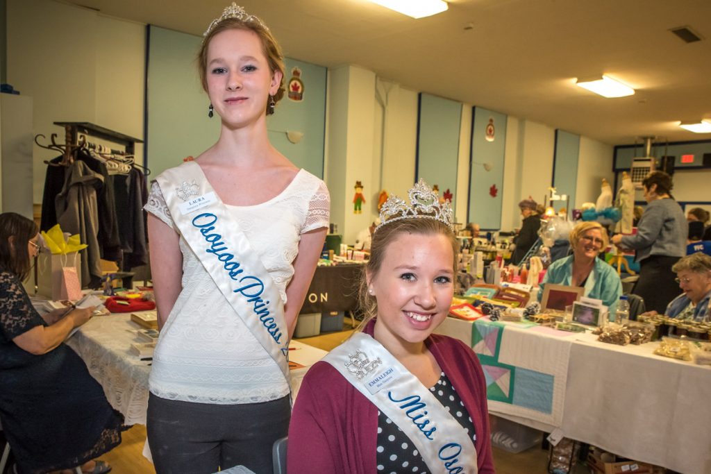 Princess Laura Devries and Miss Osoyoos Emmaleigh Diwell were helping out at the Osoyoos Royalty Tea and Craft Fair upstairs at the Legion on Saturday. Devries managed to serve tea to guests despite injuring her back while figure skating, but Diwell had to do a sit-down job because she had a sprained ankle. The fair drew a strong turnout though and hopefully both girls will soon be on the mend. (Richard McGuire photo)